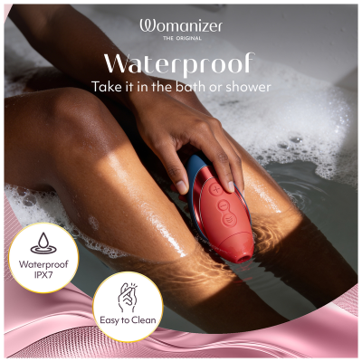 WOMANIZER - NEXT LIBERTY 3D PLEASURE AIR CLITORIAL STIMULATOR BLUE/RED - D-246840 - Dona Pimenta